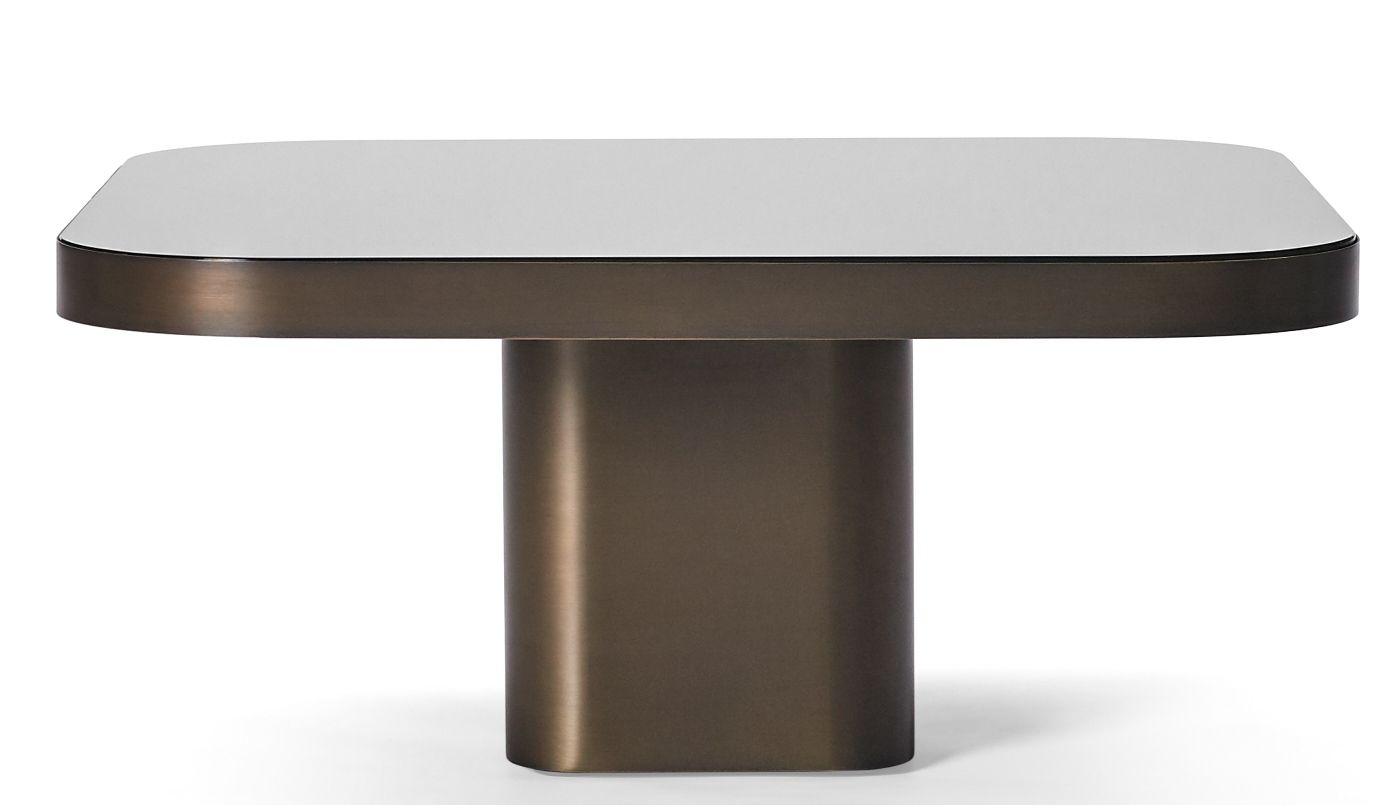 ClassiCon Bow Coffee Table No. 3: Moderner Couchtisch mit weißer Tischplatte und bronzefarbenem Metallfuß.