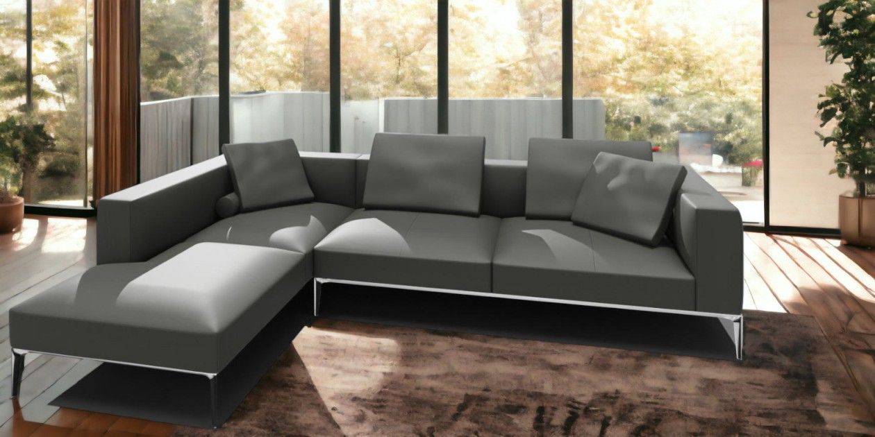 Jaan Living Sofa: Khaki Leder Ecksofa mit Kissen und Rollen für modernes Wohnen.