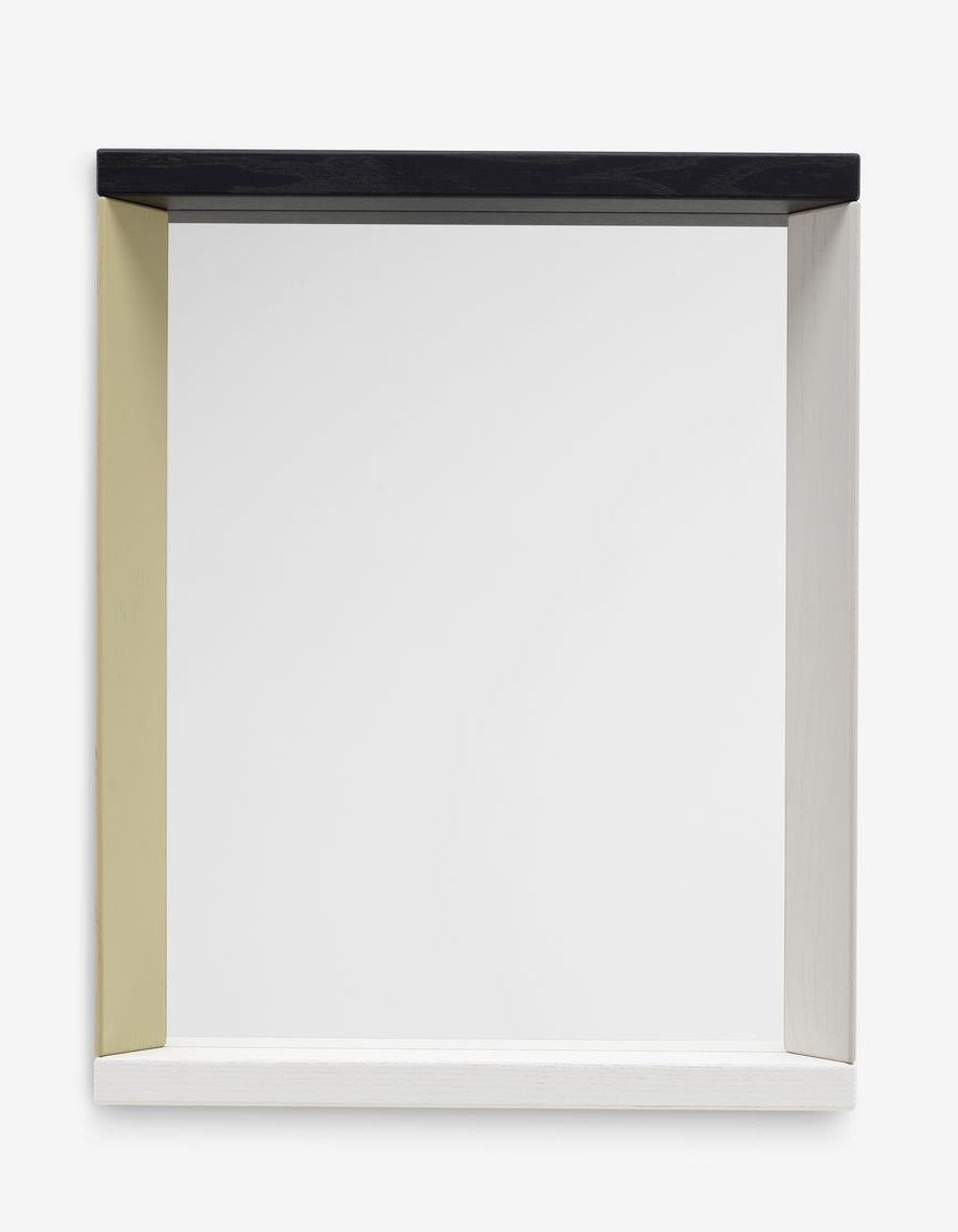 Vitra Colour Frame Spiegel mit farbigem Holzrahmen in Schwarz, Beige und Weiß.