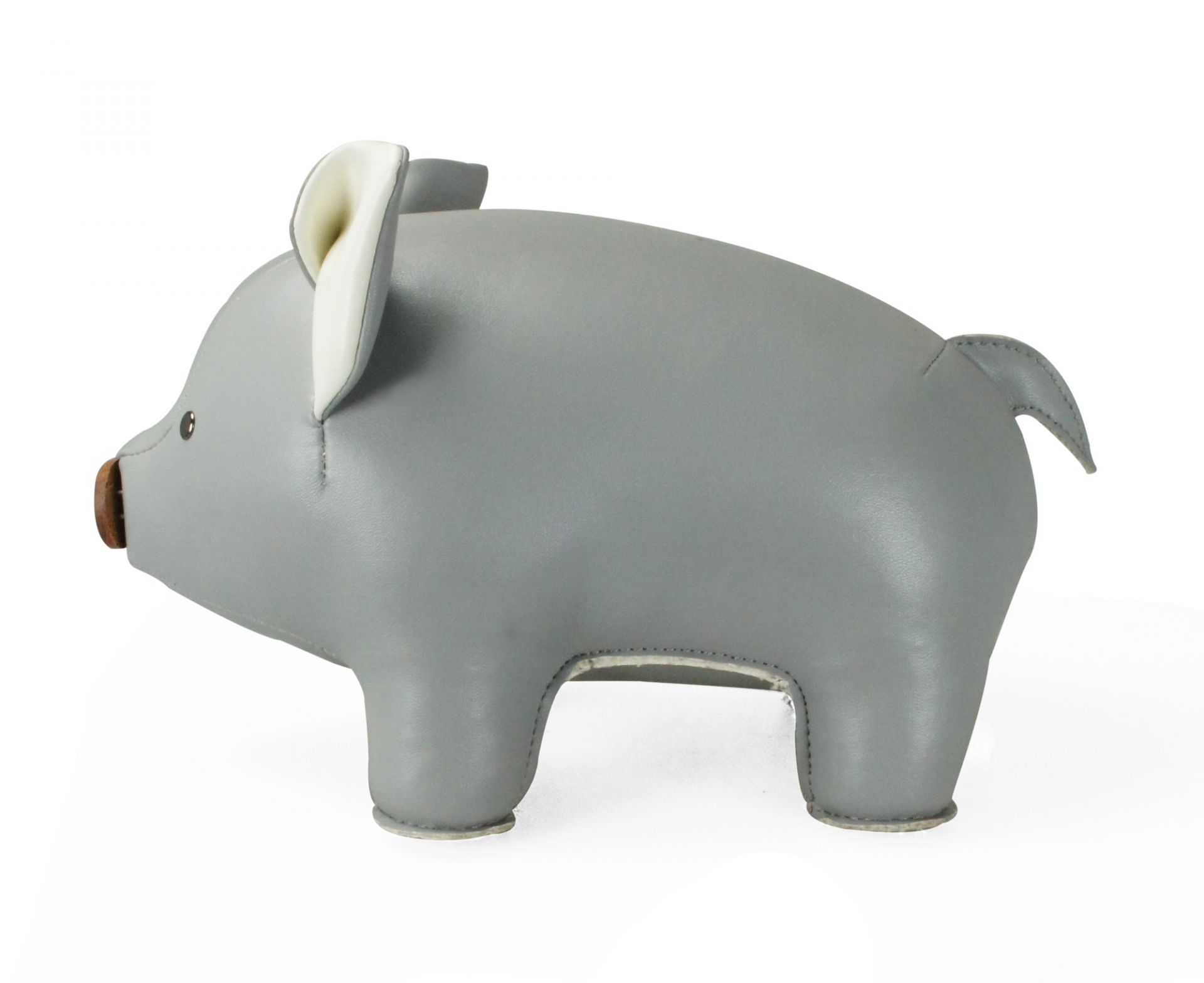 Buchstütze in Schweinchen-Form, grau-weiß, von Züny. Dekorative Buchstütze für Kinderzimmer und Bücherregal.