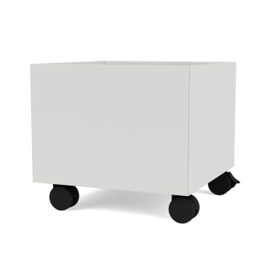 Nordische Mini Play Aufbewahrungsbox in Montana-Optik, weiße Spielzeugkiste mit schwarzen Rollen für Kinderzimmer.