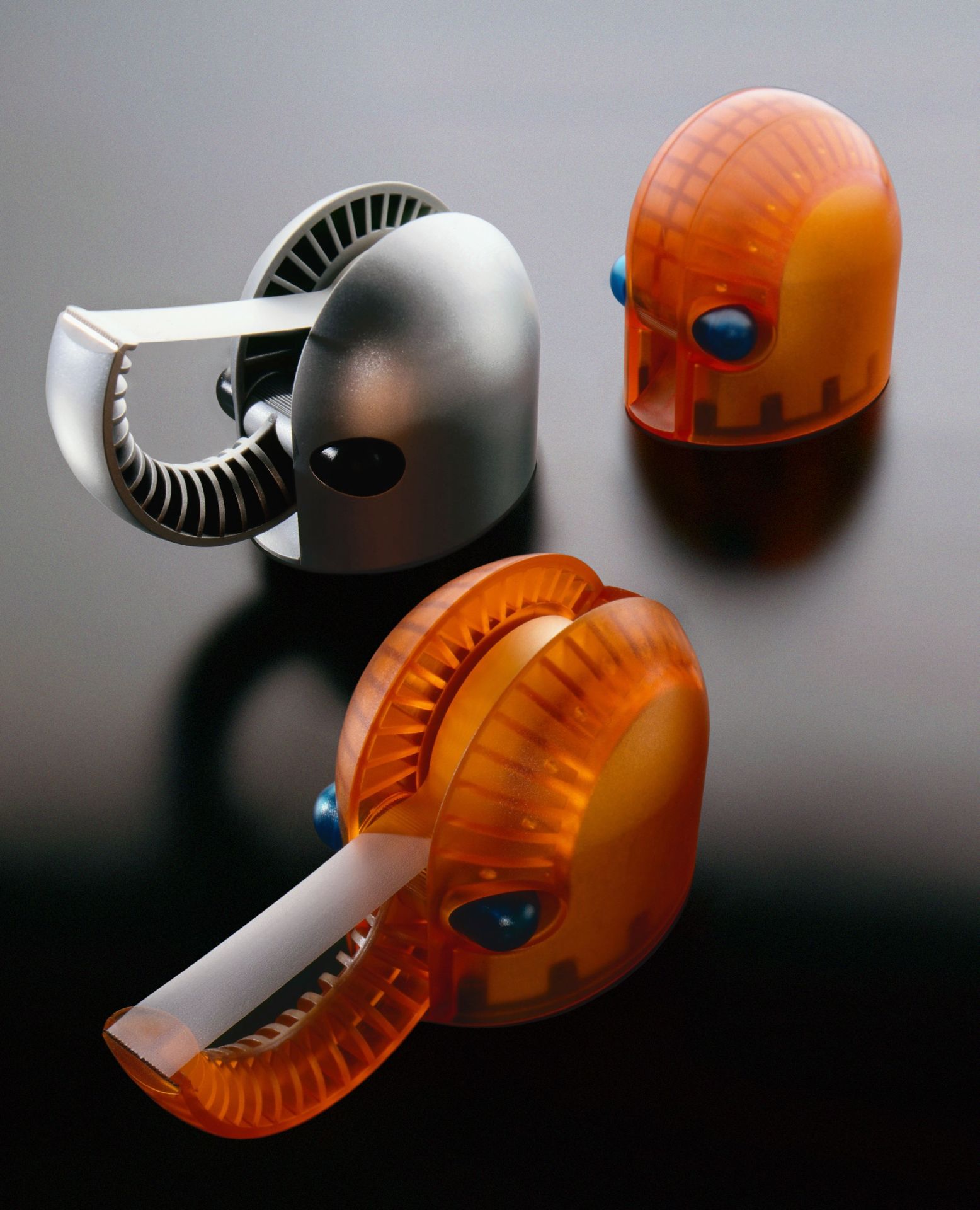 Hannibal Tape Dispenser Klebefilmabroller von Rexite in Silber und Orange, modernes Design für Bürobedarf.