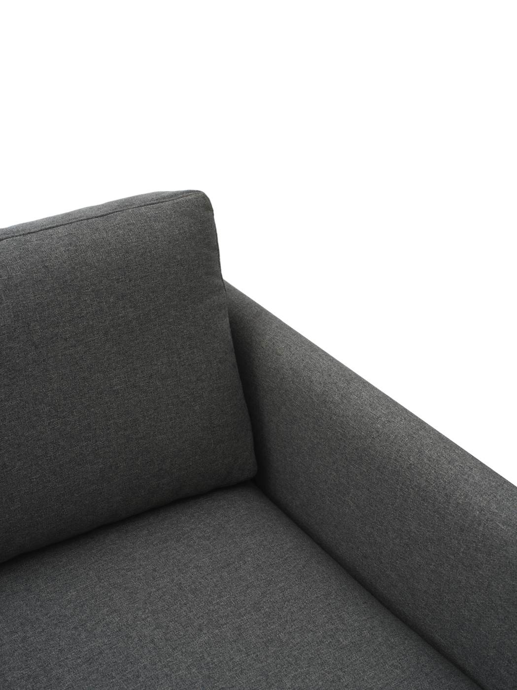Detailaufnahme des grauen Rar Lounge Chair Sessels von Normann Copenhagen, Fokus auf Kissen und Armlehne.