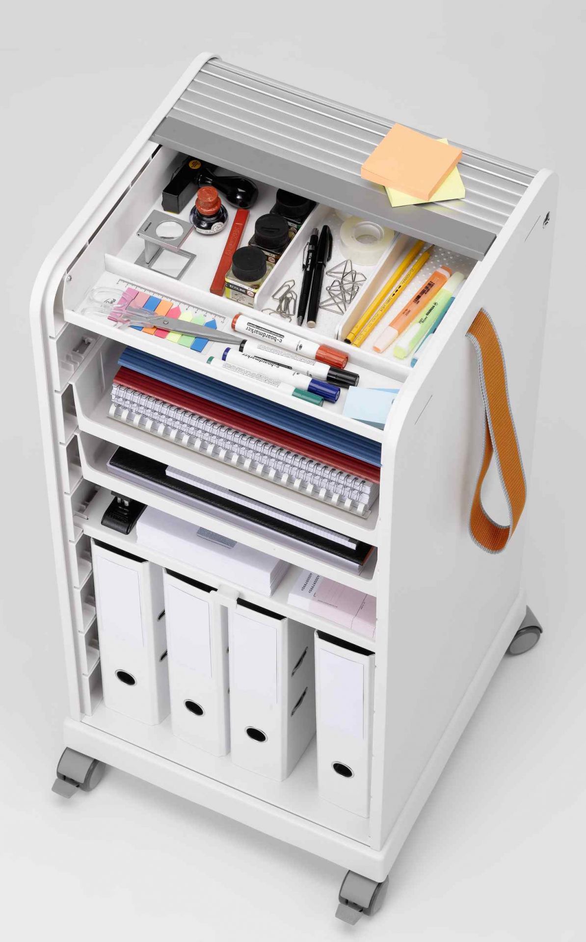 Vitra Rollcontainer Follow Me 2, weiß, mit Büroartikeln und Ordnern gefüllt, für Büro und Homeoffice.