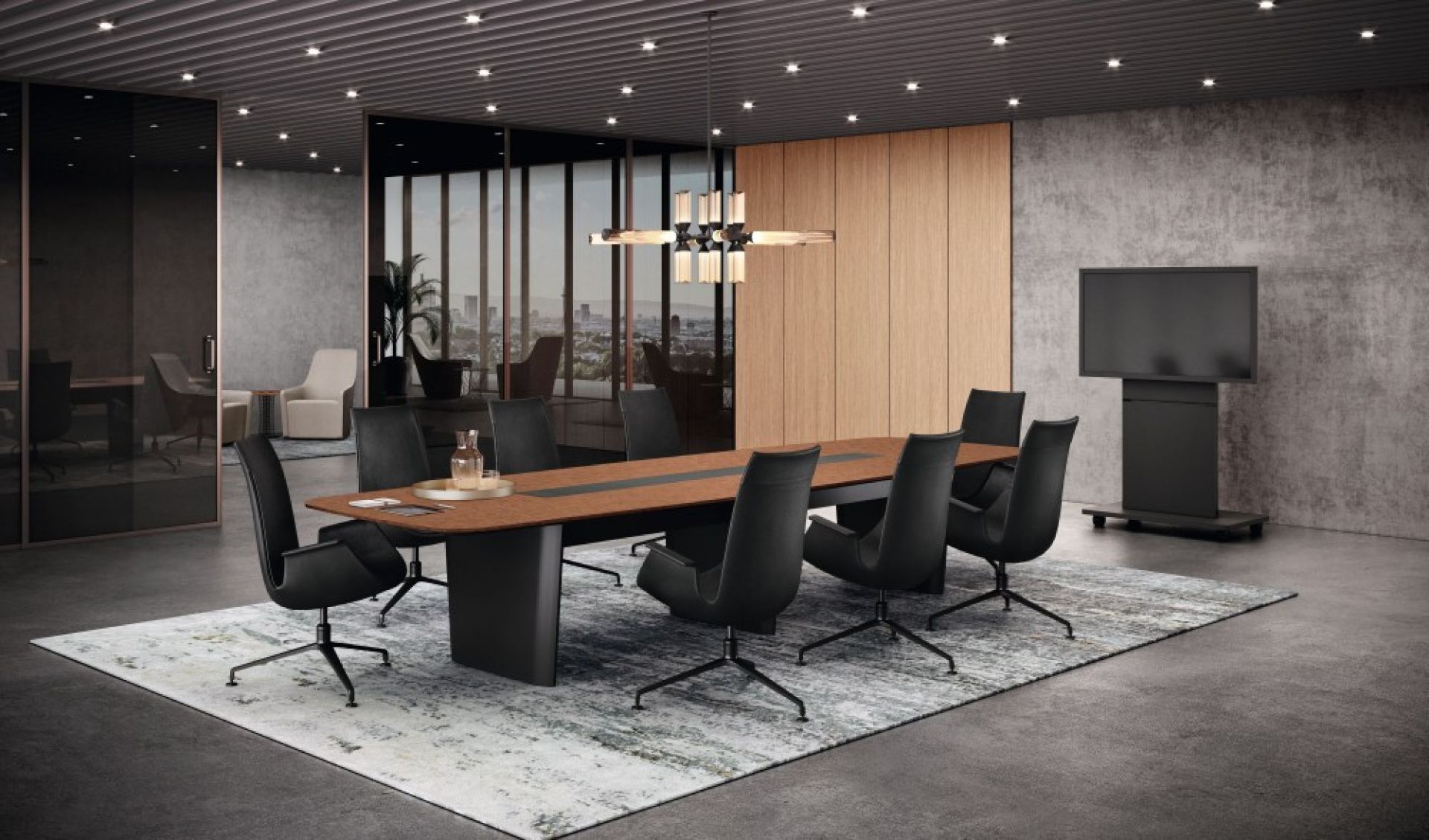 Walter Knoll FK 6725-3G Konferenzsessel in Schwarz um einen modernen Holztisch im Besprechungsraum.