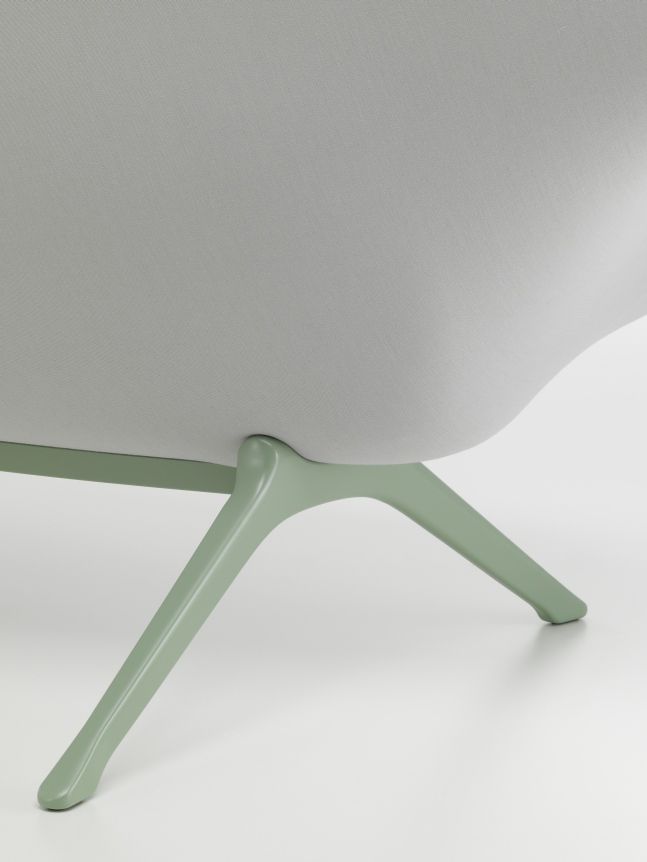 Detailaufnahme des Abalon Sofa Vitra: Hellgrauer Stoffbezug und hellgrünes, modernes Untergestell. Design Sofa.