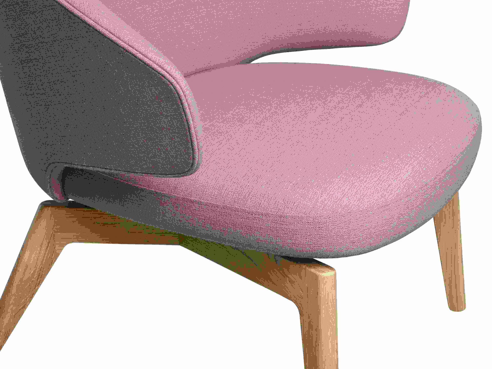 Detailaufnahme vom Fritz Hansen Let Sessel mit rosa Sitzfläche und grauer Rückenlehne auf Holzbeinen.