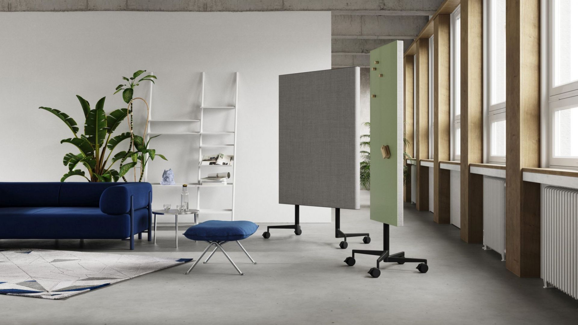 Zwei Chat Board Move Acoustic Stellwände in Grau und Grün im modernen Büro mit Rollen.