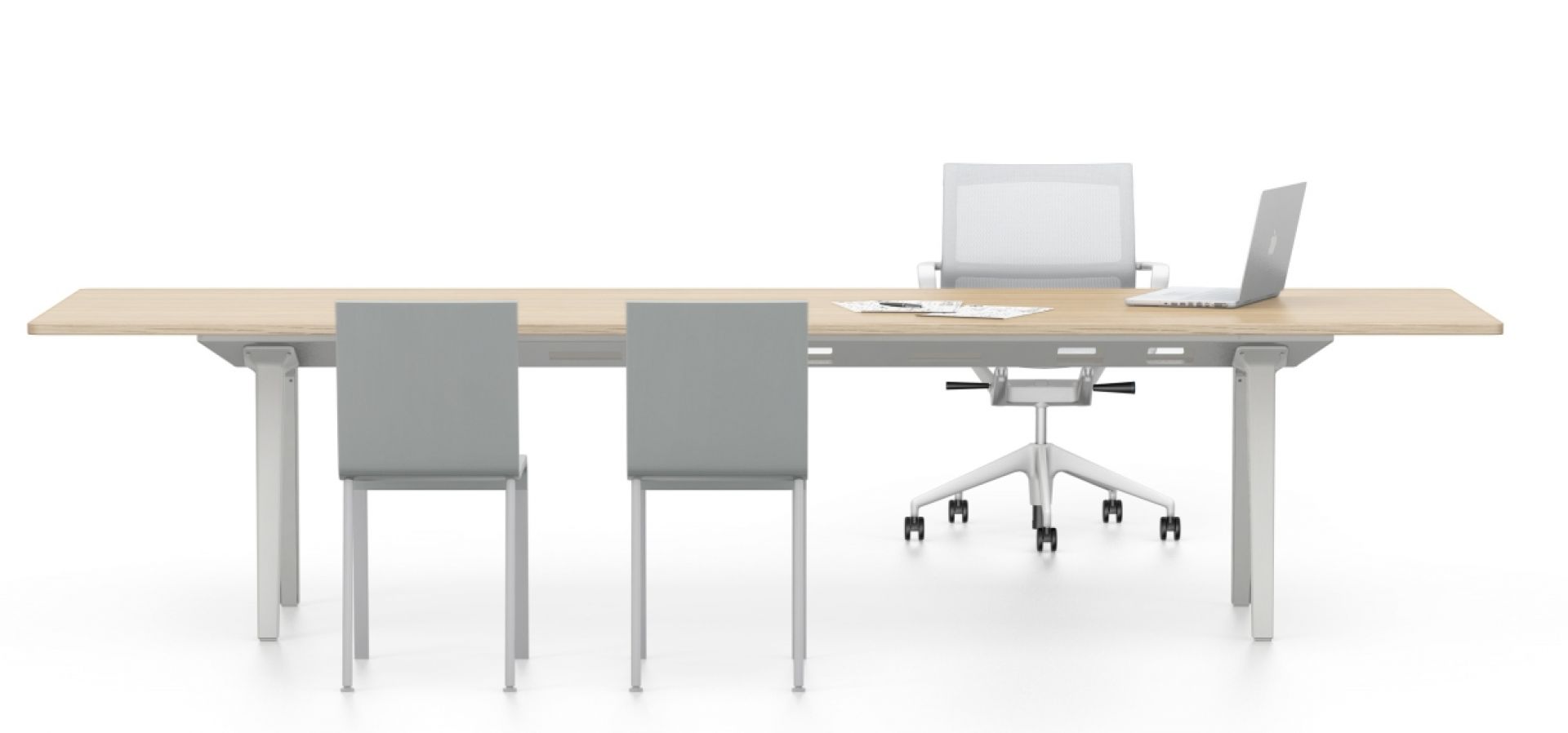 Physix Bürodrehstuhl von Vitra mit hellem Holztisch, zwei Stühlen und Laptop im modernen Büro.