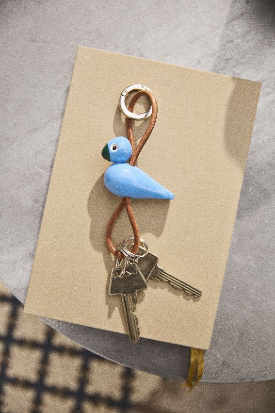 Vogel Blauw sleutelhanger van zilverkleurig metaal met natuurlijk leer Kay Bojesen