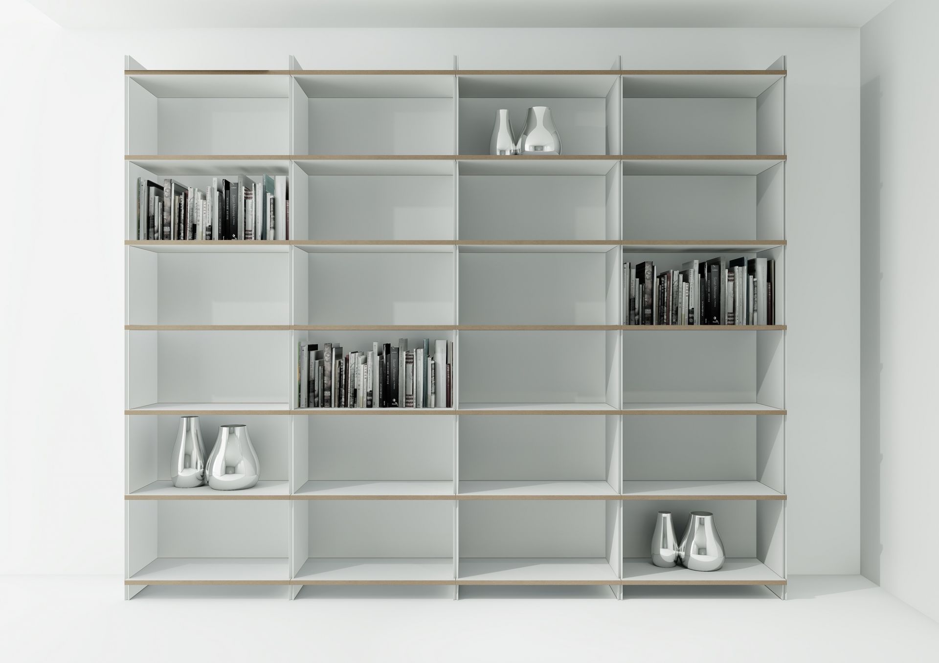 Tojo Mehrfach Regal Grundmodul, weißes modulares Bücherregal mit vier Fächern, teilweise gefüllt mit Büchern und Dekoration.