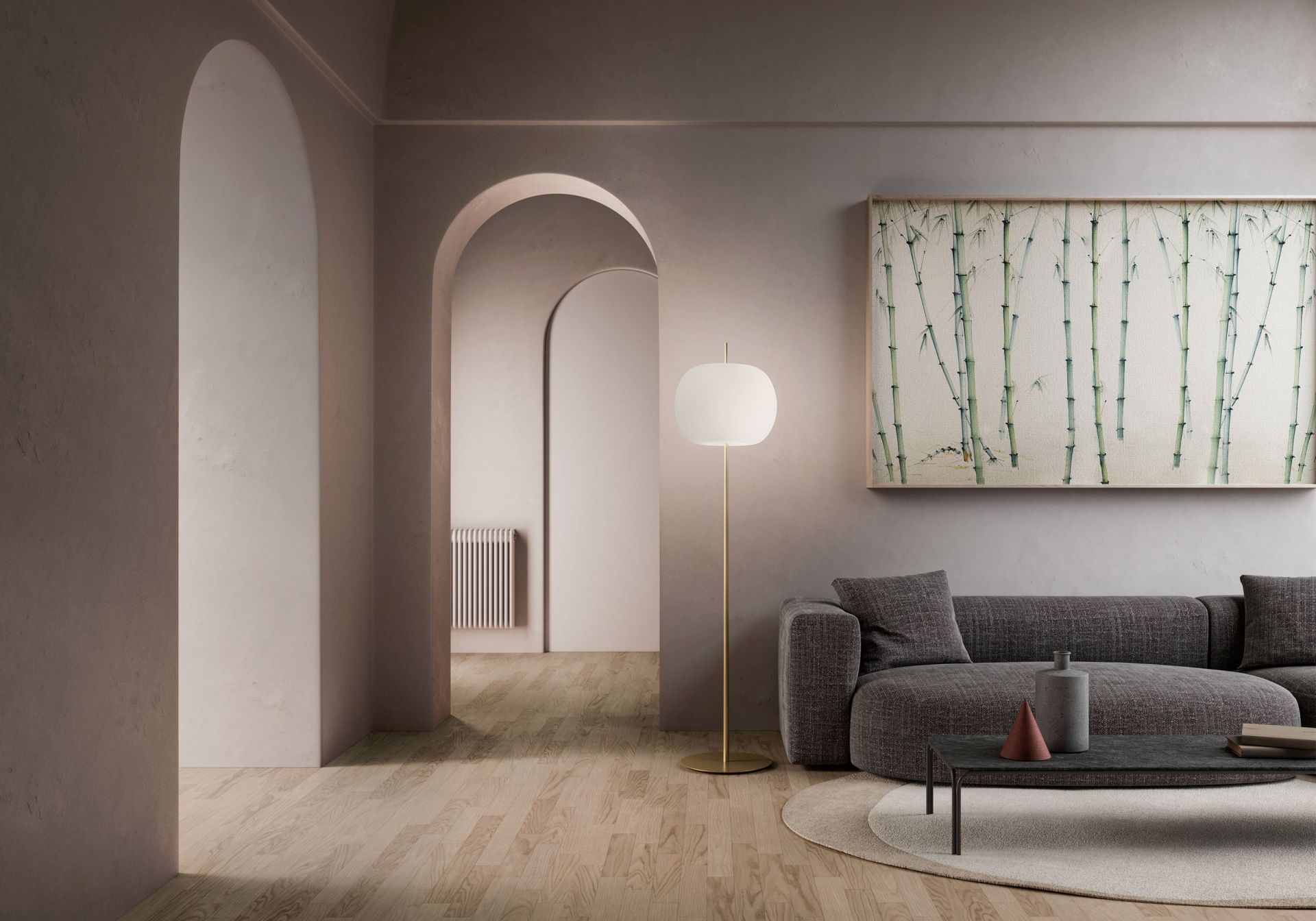 Kushi XL Stehleuchte Kupfer Kdln im Wohnzimmer, modernes Design mit sanftem Licht.