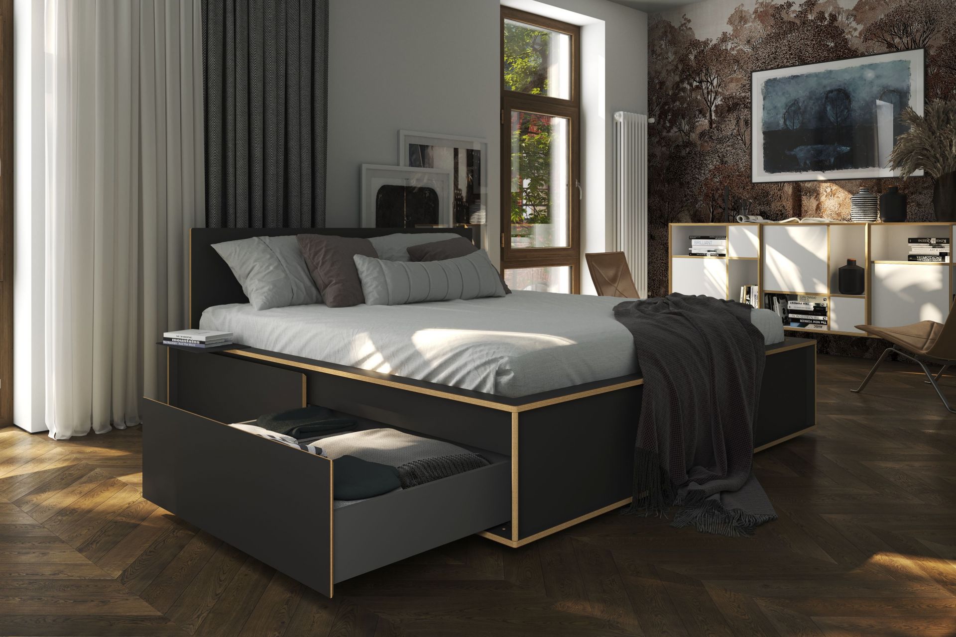 Spaze Bett von Müller Möbelwerkstätten in Schwarz mit Schubladen und hellem Holzrahmen im Schlafzimmer.