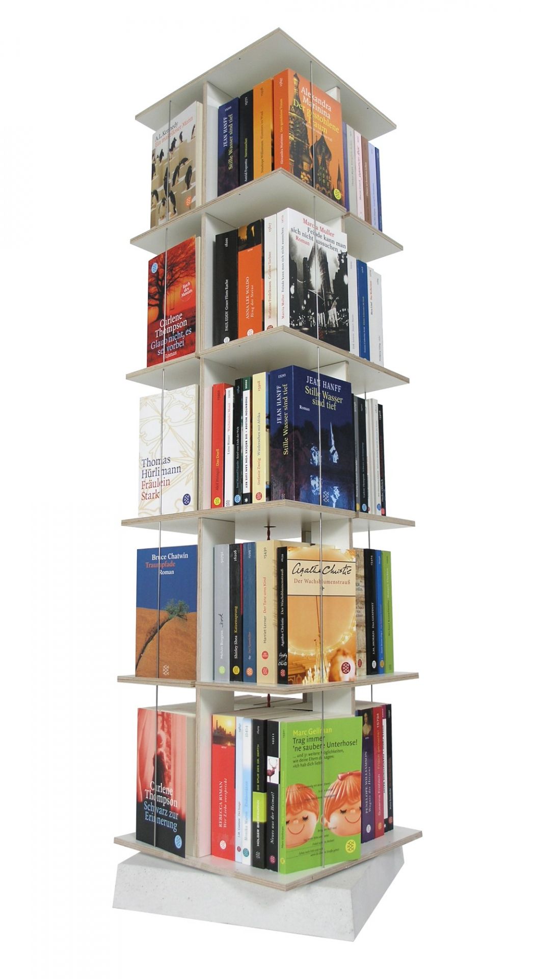 Nils Holger Moormann Buchstabler Bücherregal: Weißes Regal mit Büchern und DVDs gefüllt. Bücherregal, DVD-Regal.