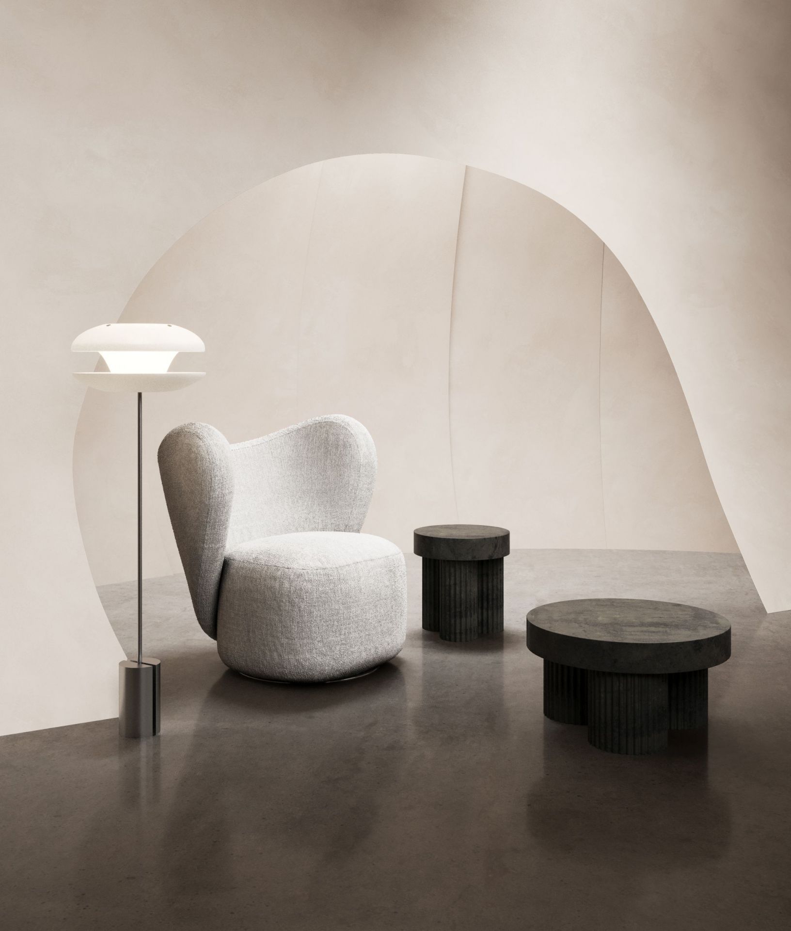 Gear Couchtisch von Norr11 in Kreide, runder Couchtisch aus dunklem Stein im minimalistischen Wohnzimmer.