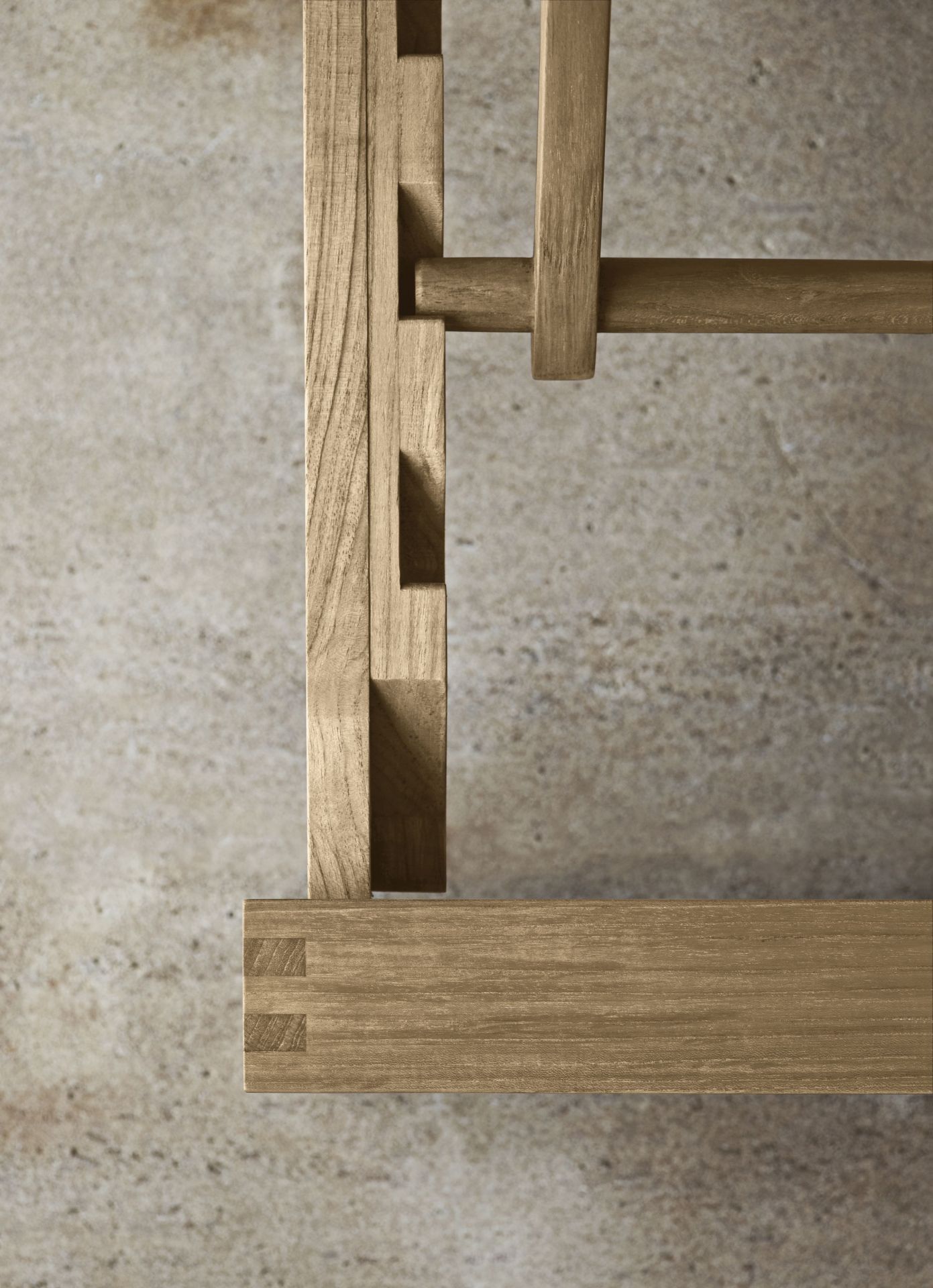 Detailaufnahme der Holzverbindungen der Bodil Kjaer Sonnenliege aus Teakholz für den Außenbereich.