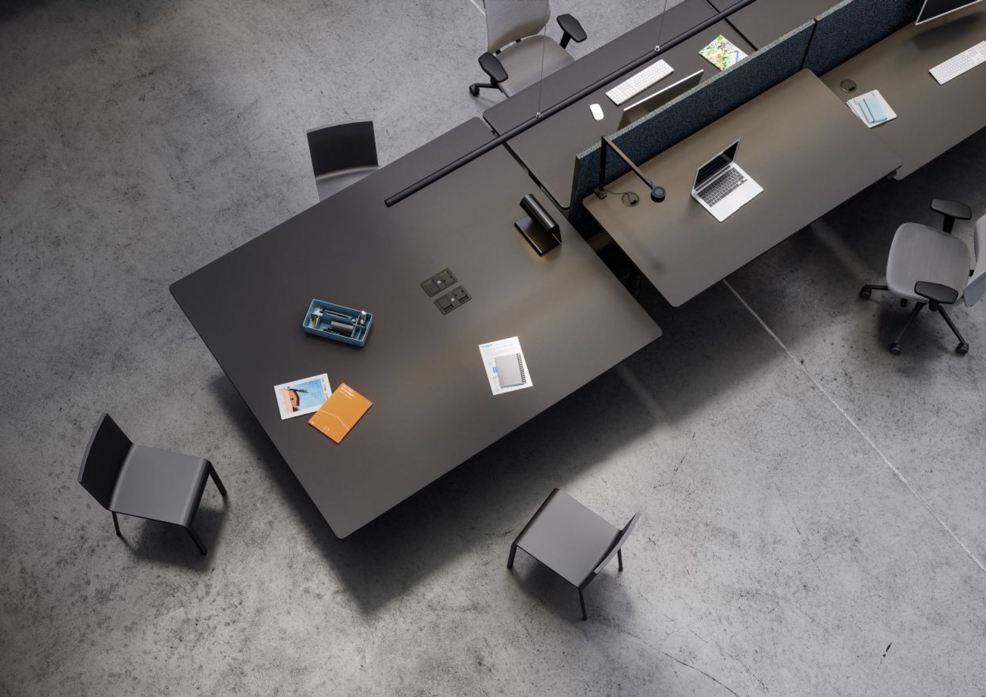 Vogelperspektive auf einen modernen Büroraum mit einem schwarzen Tyde Sitz- und Stehtisch von Vitra, 180 cm.