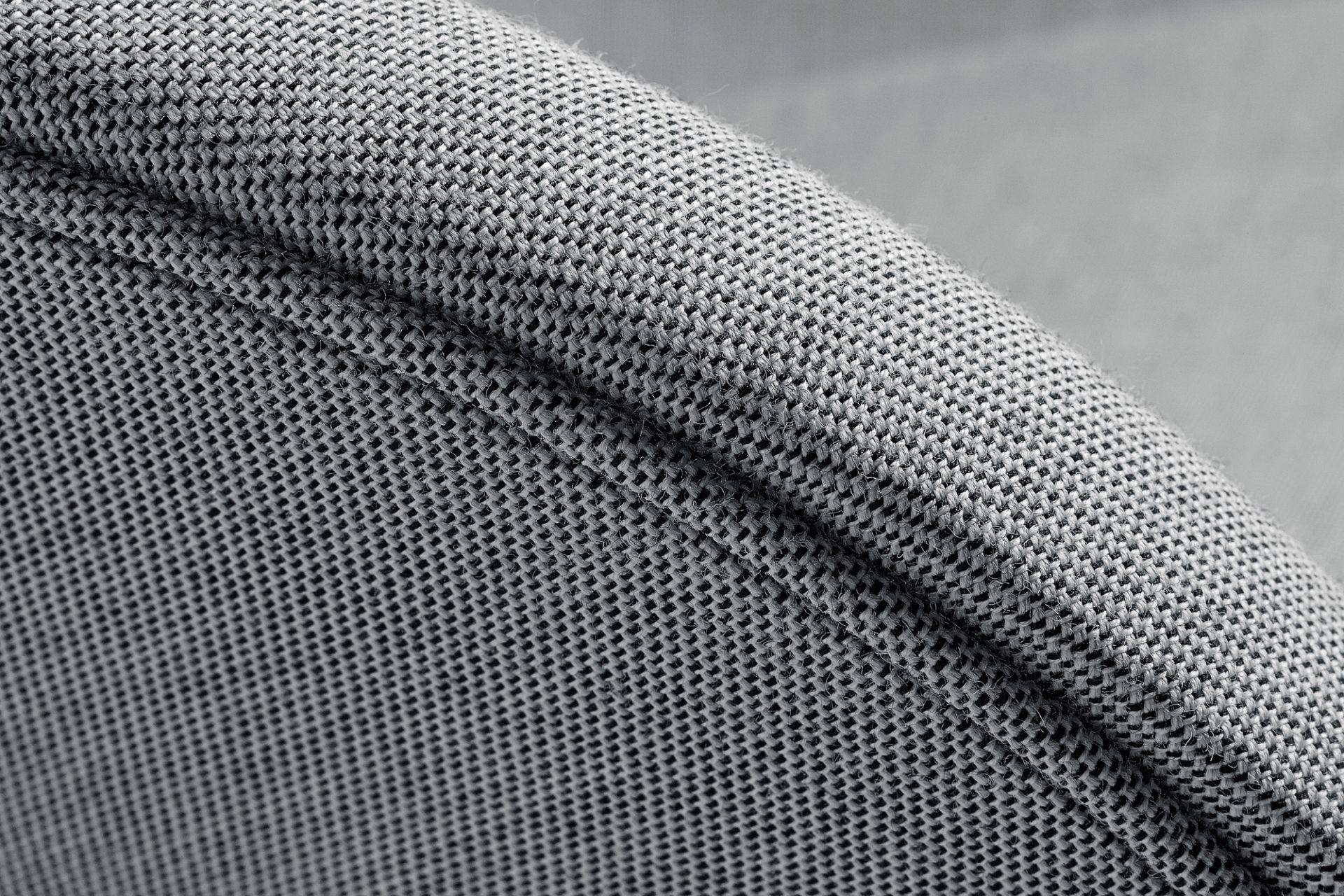 Detailaufnahme des grauen Stoffbezugs vom Hay About a Lounge Sessel AAL 92.