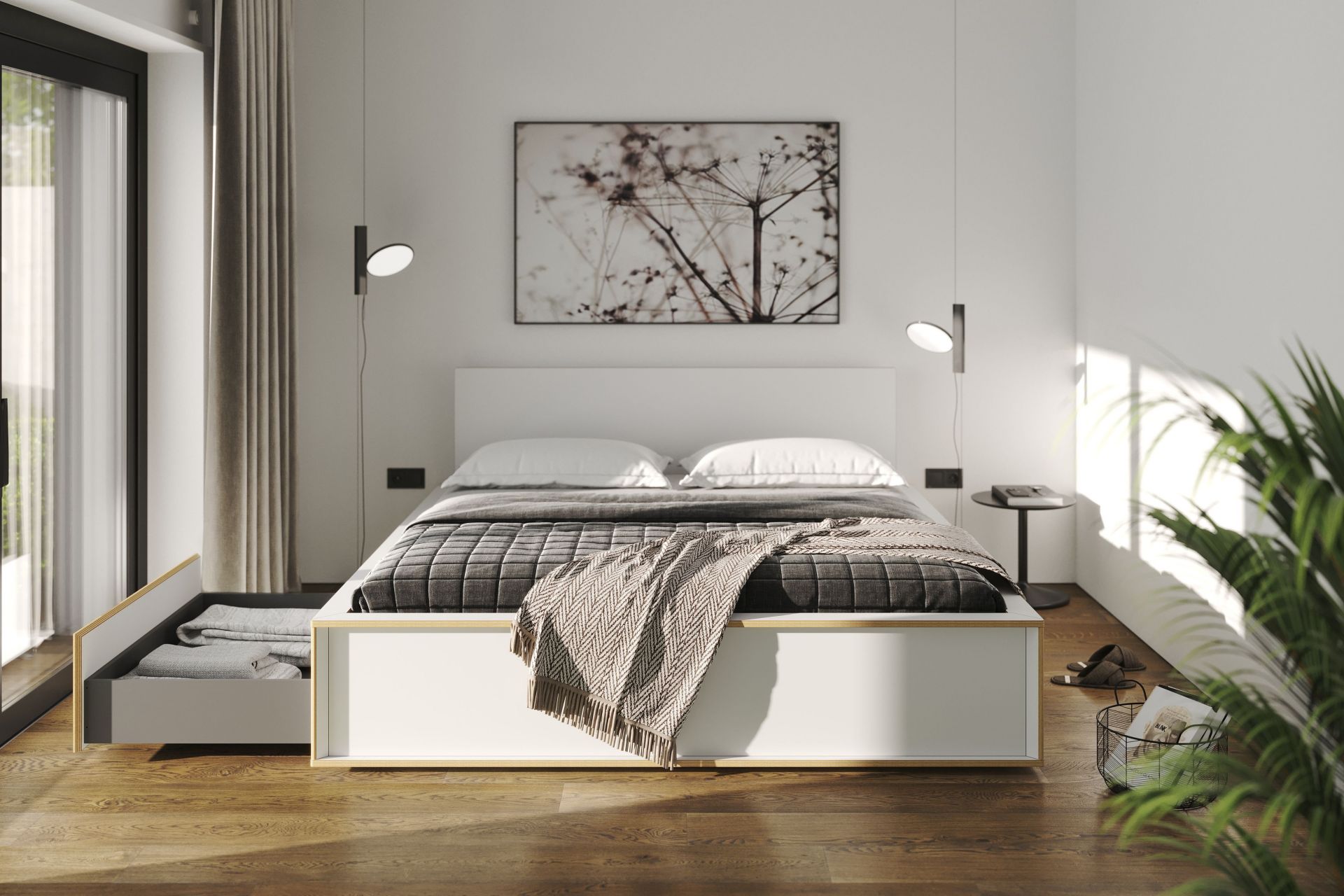 Spaze Bett von Müller Möbelwerkstätten in Weiß mit Schublade und Textilien im Schlafzimmer.