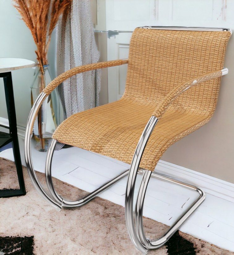 MR Stuhl mit Armlehnen, Rattan-Sitzfläche und verchromtem Stahlrohrgestell von Knoll International. Designklassiker.