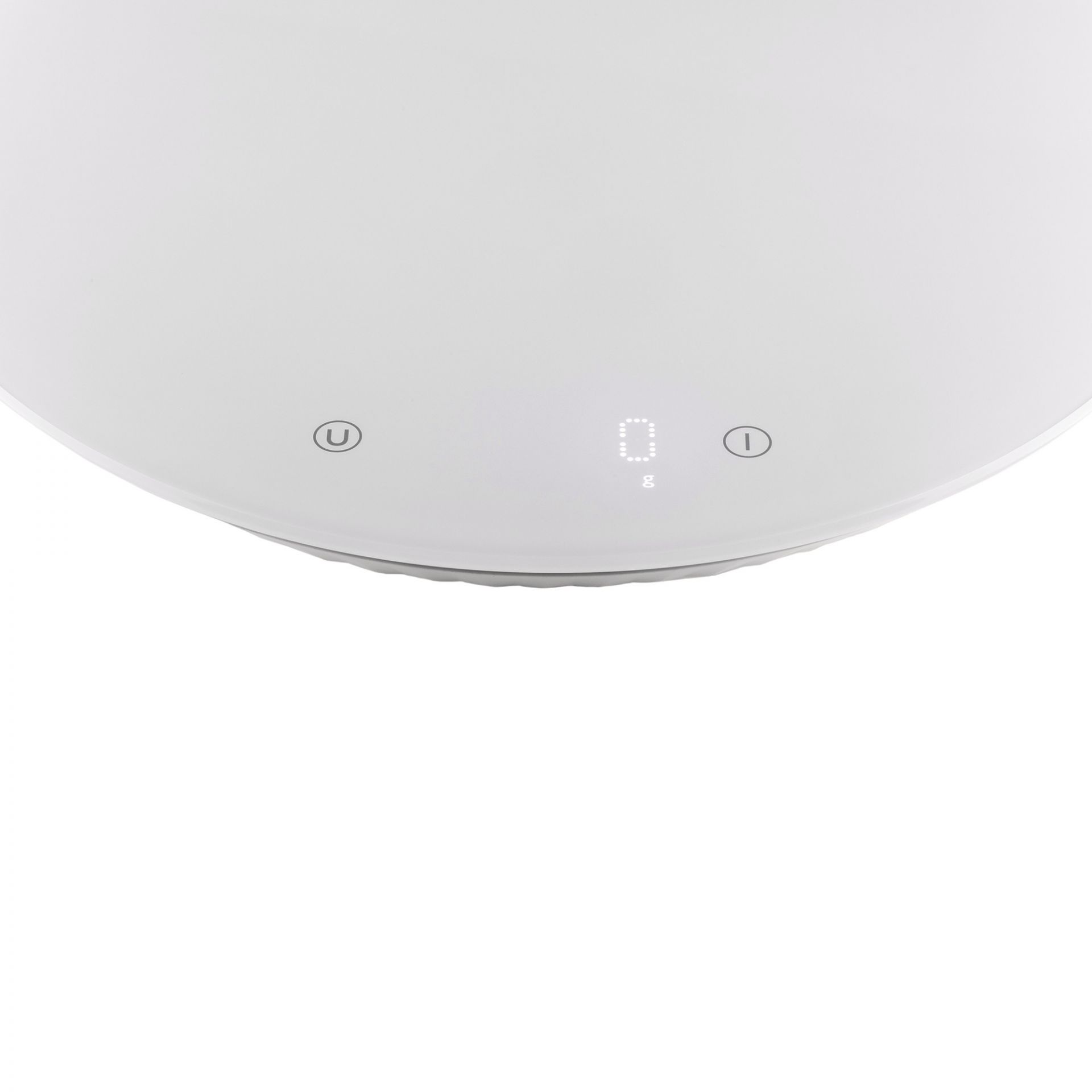 Weiße Alessi Küchenwaage mit digitaler Anzeige. Ideal zum Abwiegen von Zutaten beim Kochen und Backen.