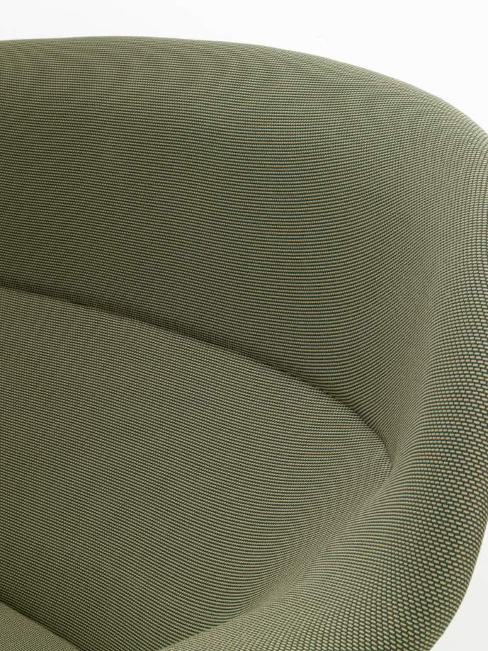 Detailaufnahme des olivgrünen Abalon Sofas von Vitra, das die Textur und Form des Möbelstücks hervorhebt.