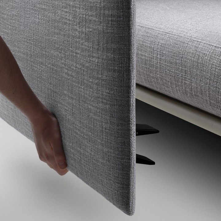 Detailaufnahme des Vitra Anagram Panels (90 cm) in Grau, das an einem modularen Möbelstück befestigt wird.