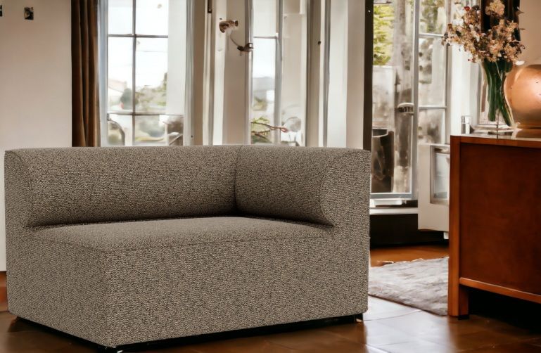 Eave Modular Sofa Ecke von Audo Copenhagen, grauer Stoffbezug, modernes Wohnzimmer Design.