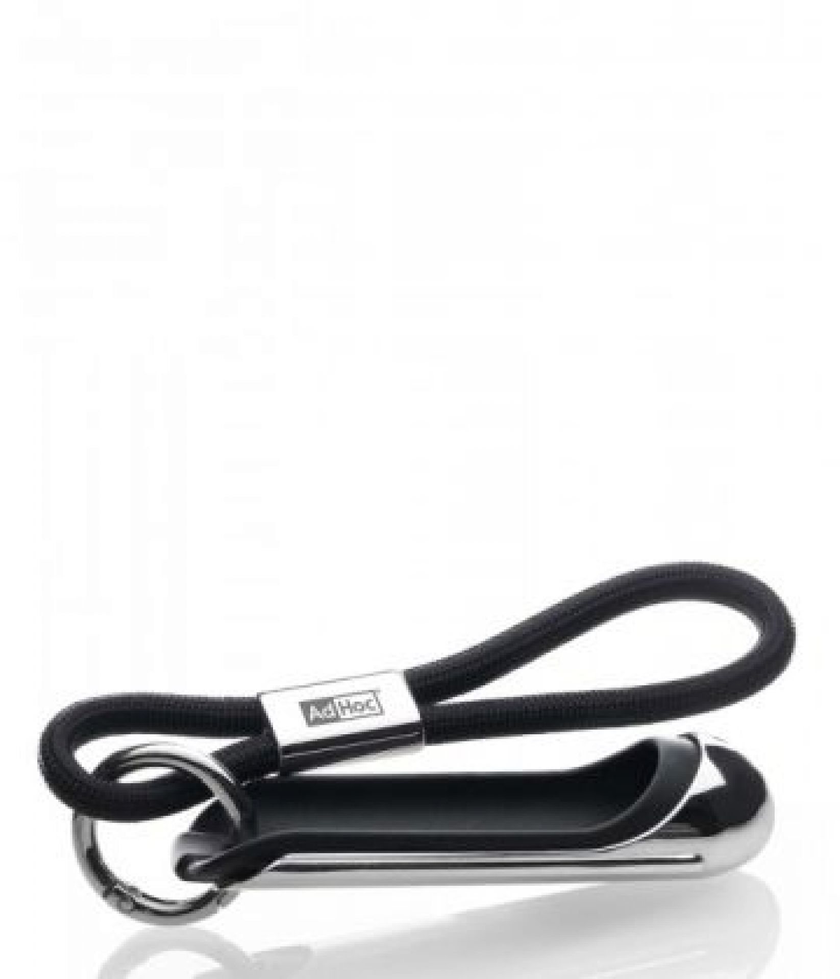 Fingerschutz SafetyTouch® von AdHoc: Schwarzer Küchenhelfer mit Schlaufe und Ring zum sicheren Schneiden in der Küche.