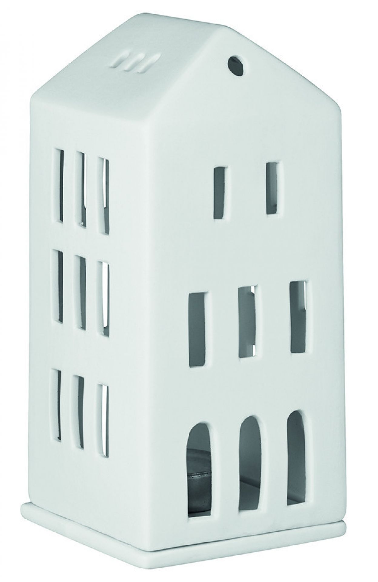 Detailaufnahme eines weißen Räder Lichthaus aus der Zuhause Kollektion mit Teelicht.