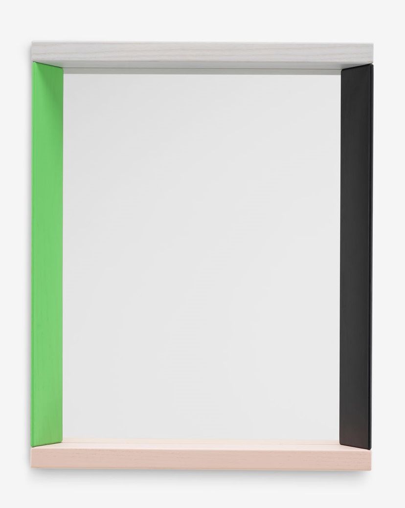 Vitra Colour Frame Spiegel mit farbigem Rahmen in Grün, Schwarz, Weiß und Rosa.