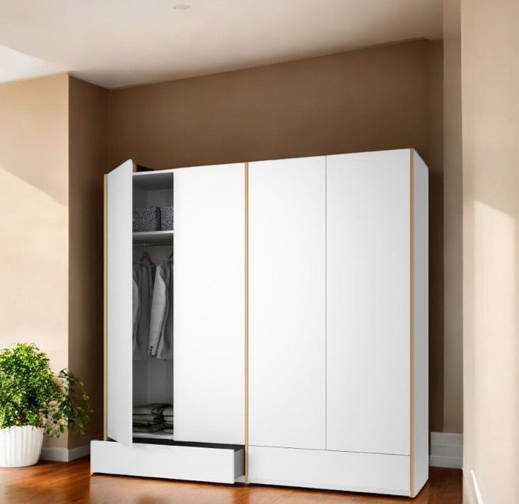 MODULAR PLUS Schrank von Müller Möbelwerkstätten mit zwei Schubkästen, weiße Front und offene Tür.
