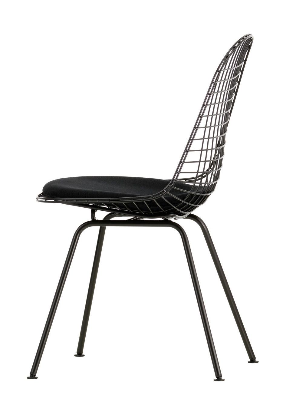 DKX-5 Wire Chair Stuhl von Vitra mit schwarzem Sitzkissen, Drahtgestell und vierbeinigen Stahlrohrgestell.