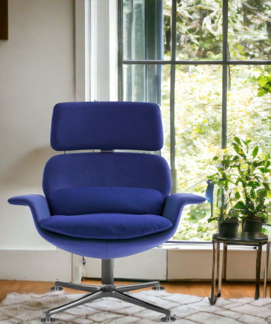 Blauer KN02 Drehsessel mit hoher Rückenlehne von Knoll International, ideal für entspanntes Sitzen und Liegen.