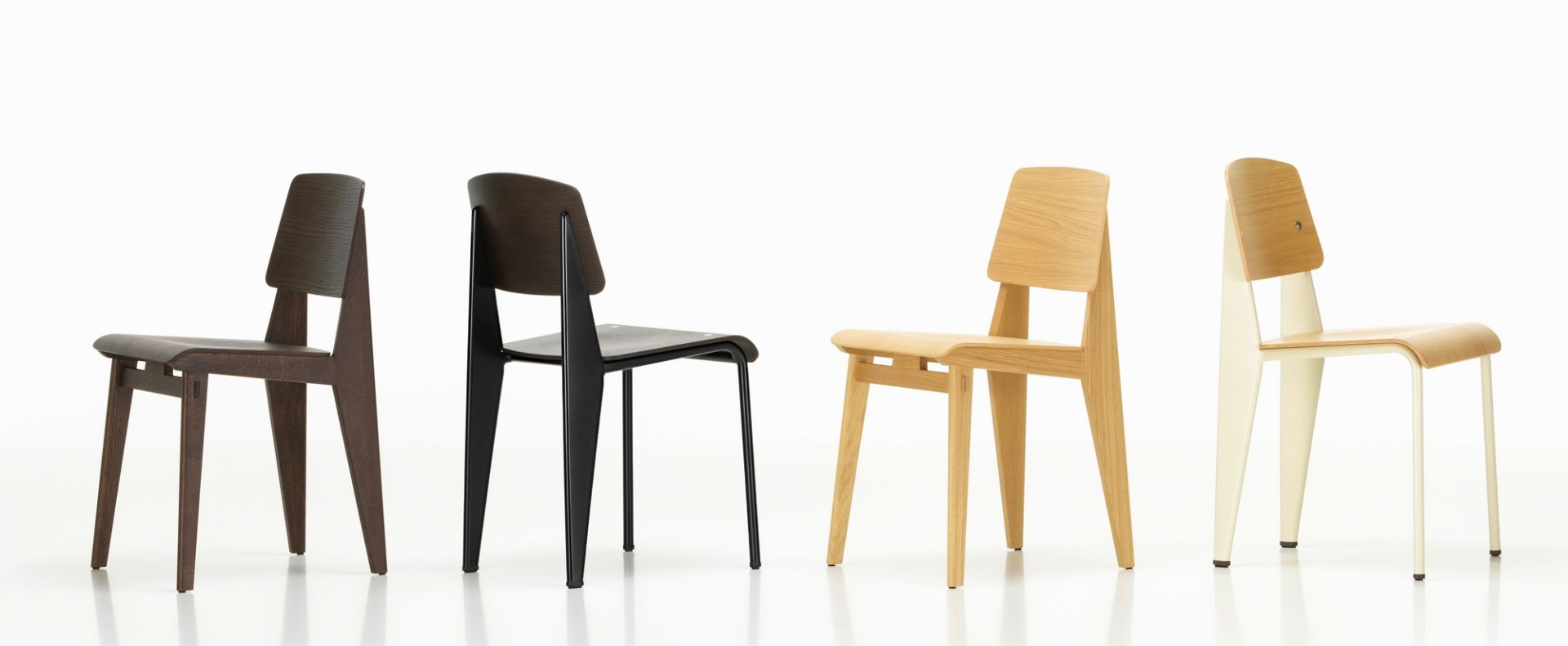 Vitra Chaise Tout Bois Stühle in verschiedenen Holzfarben, modernes Design für Esszimmer und Wohnbereich.