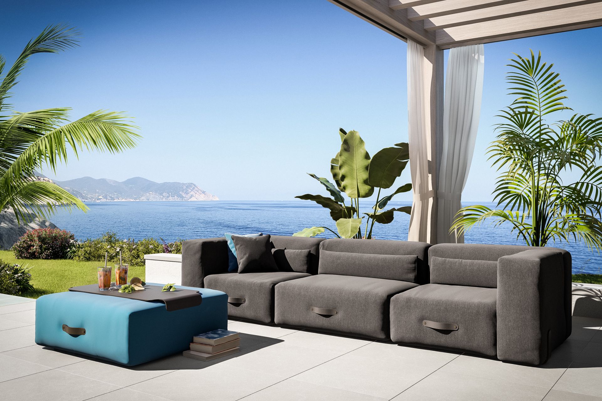 Miami Outdoor Sofa Lounger Taupe von Conmoto mit Meerblick, moderne Gartenmöbel und Lounge-Atmosphäre.