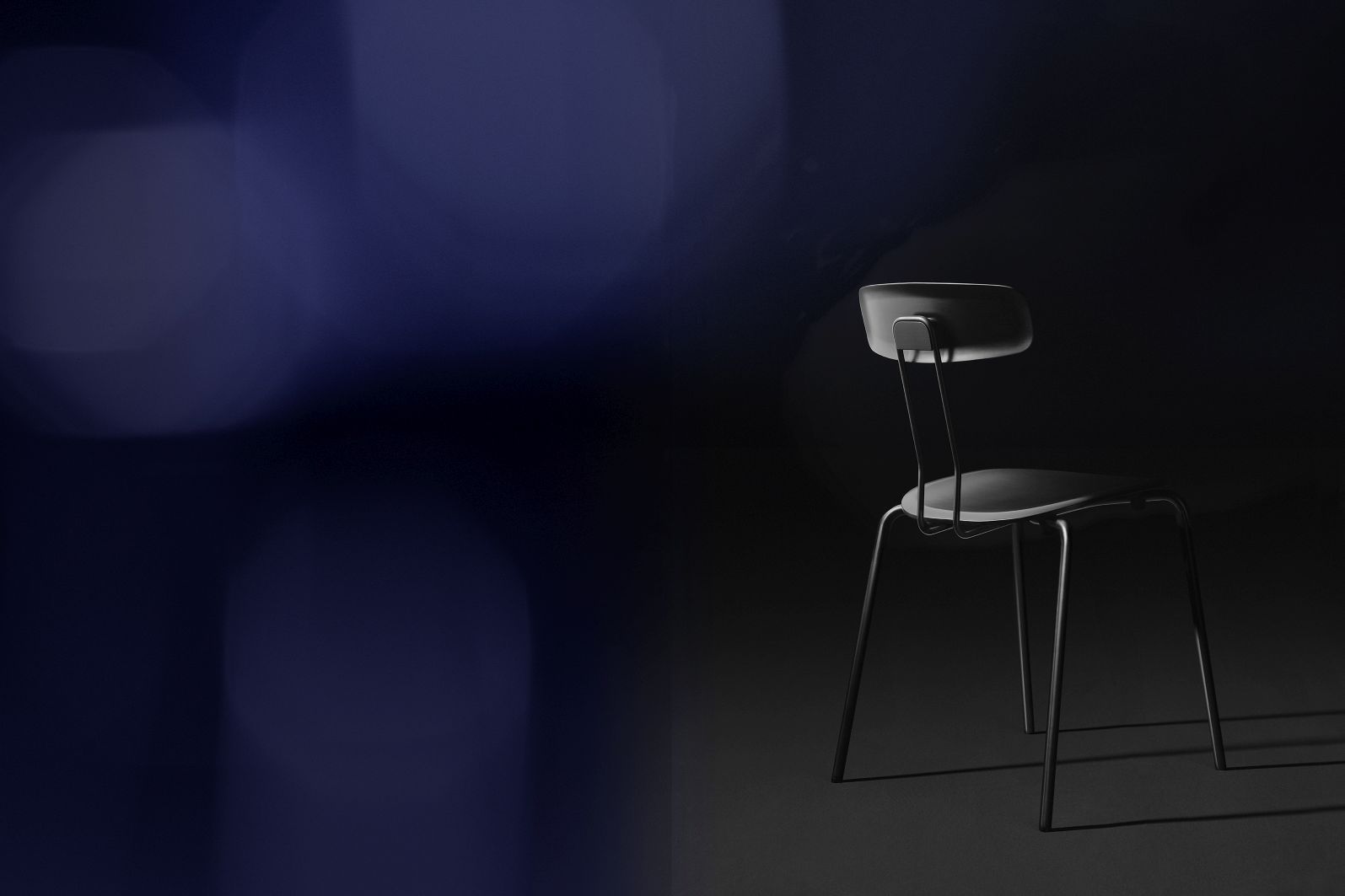 Okito Chair Stuhl Zeitraum, minimalistischer Stuhl mit Stahlgestell und Rückenlehne in dunkler Studioaufnahme.