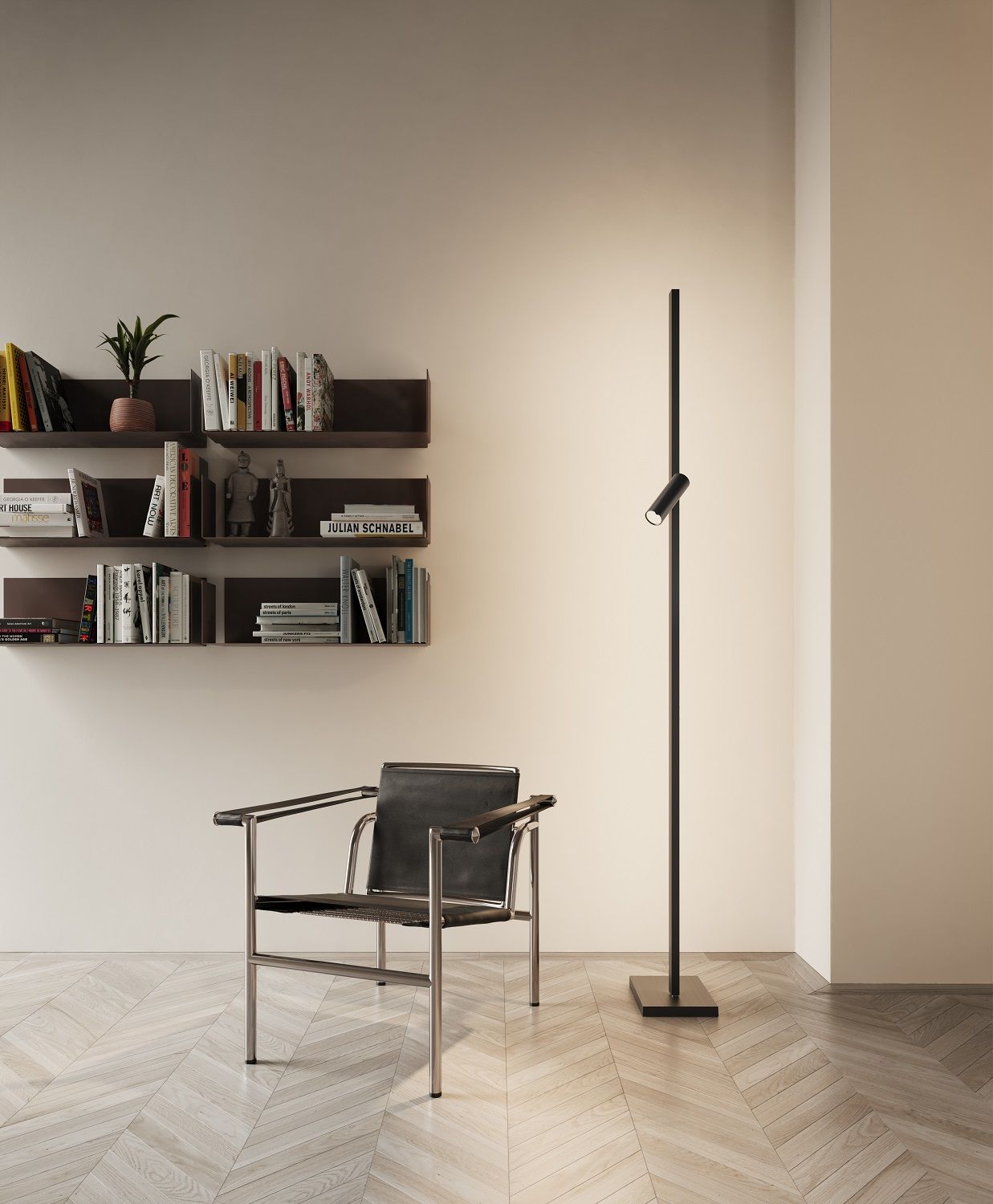 Zen X Floor Stehleuchte in minimalistischem Design neben einem Sessel und Bücherregal.