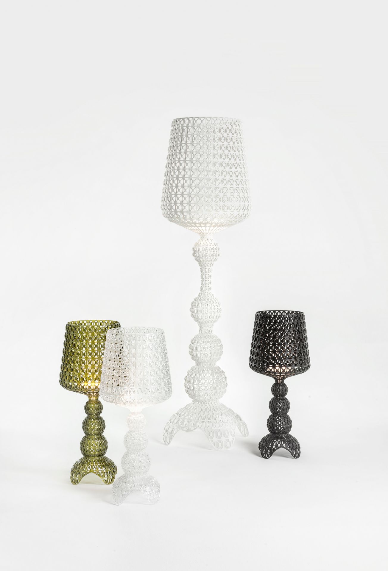 Kartell Mini Kabuki Tischleuchten in Klar, Grün und Schwarz, filigranes Design, modernes Wohnaccessoire.