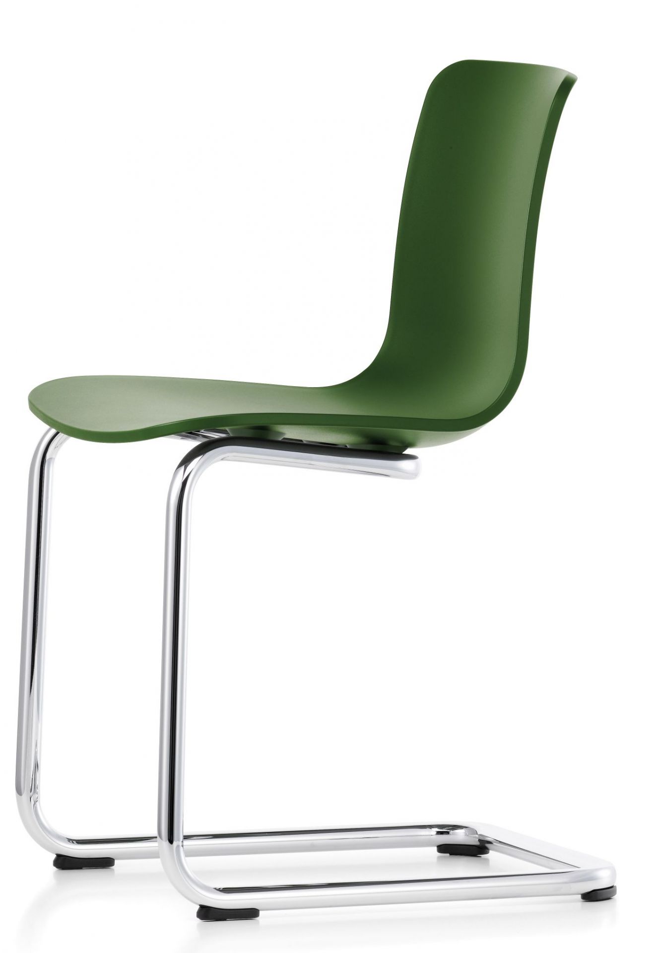 Grüner Vitra Hal Freischwinger Stuhl mit Chromgestell, seitliche Ansicht. Bürostuhl und Designklassiker.