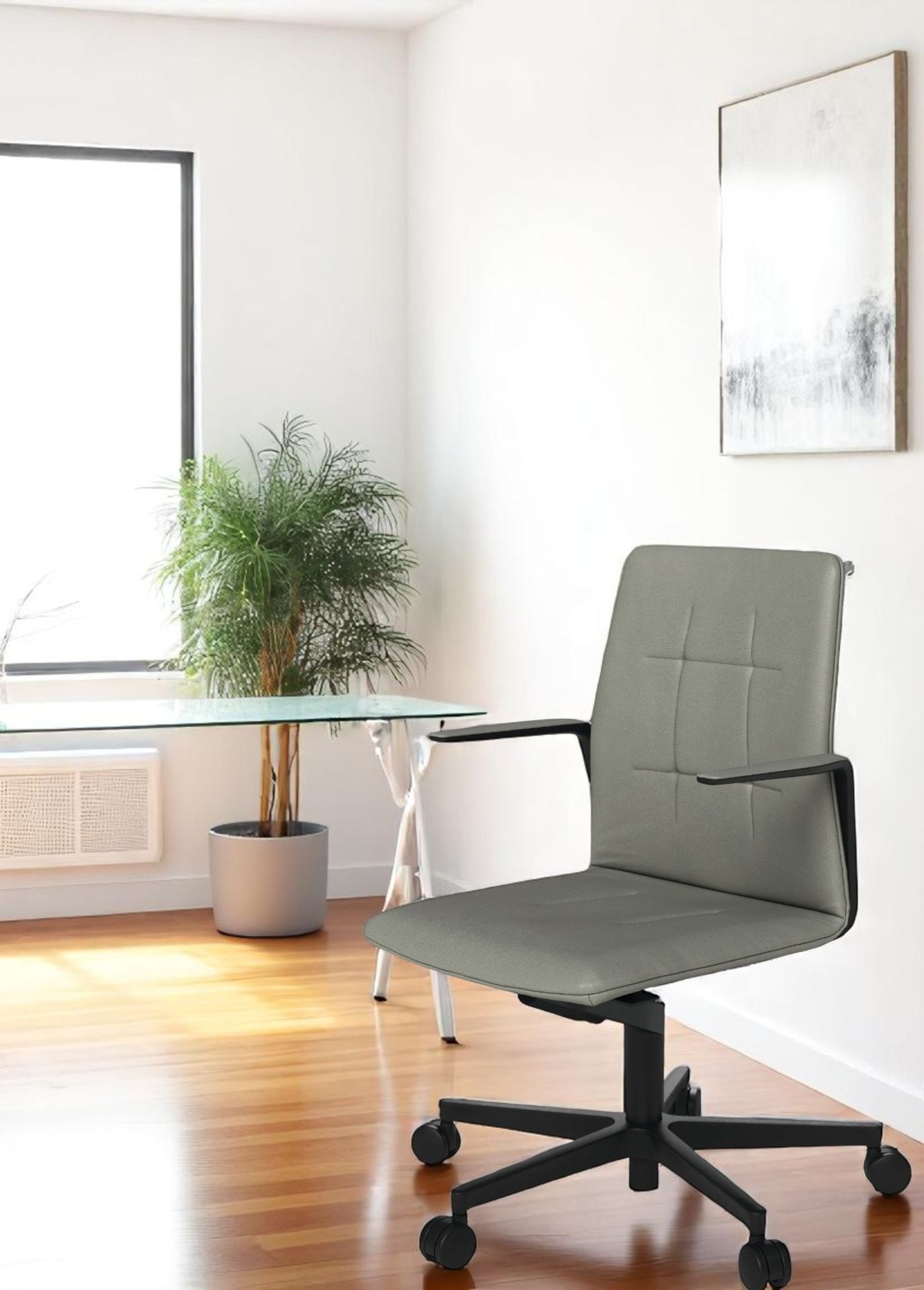 Grauer Leadchair Evo Drehstuhl von Walter Knoll mit schwarzem Fünfsternfuß im modernen Büro.