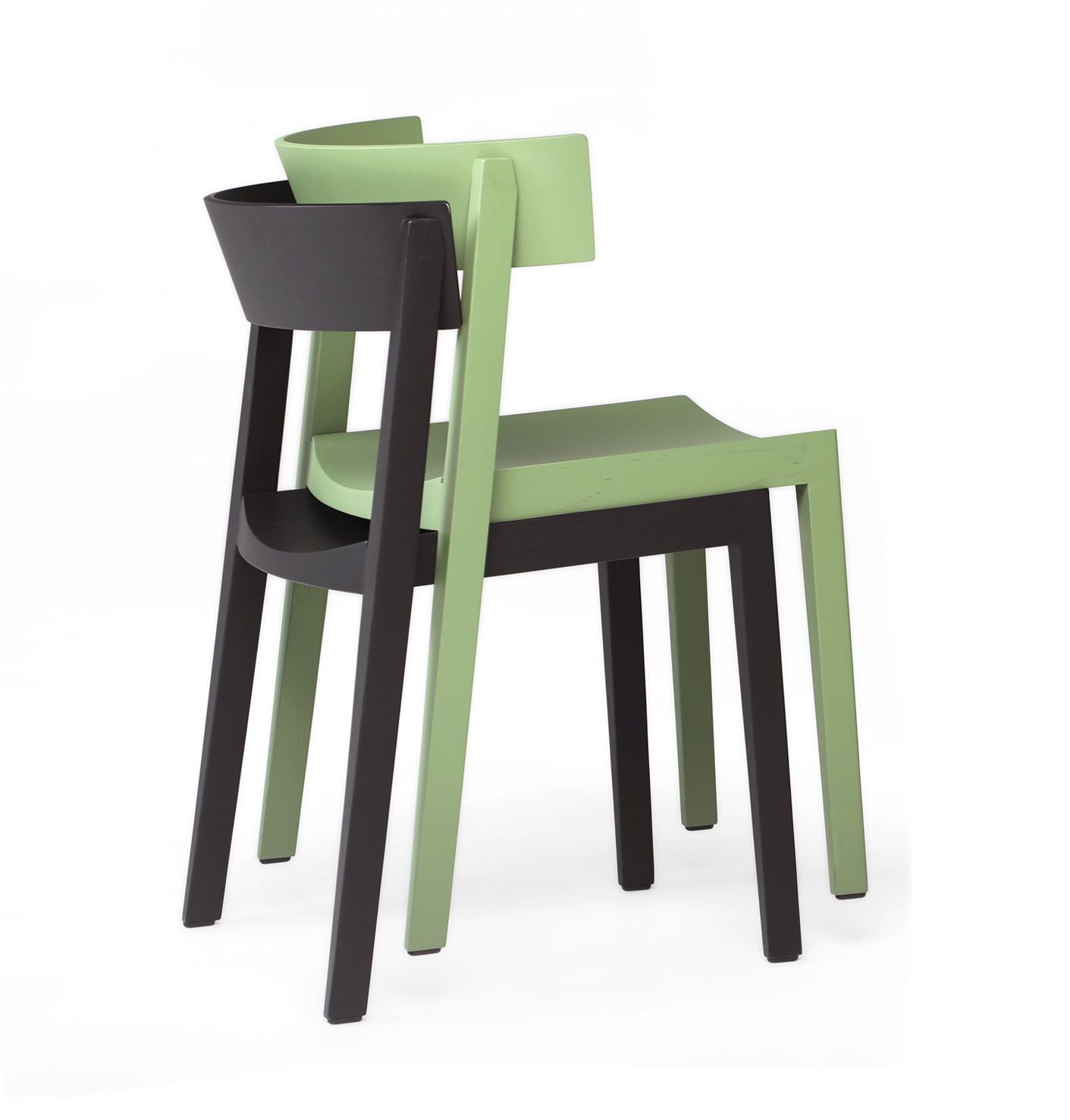 Zwei Bik Stühle von Prostoria in Schwarz und Grün gestapelt, minimalistisches Design für Esszimmer und Küche.