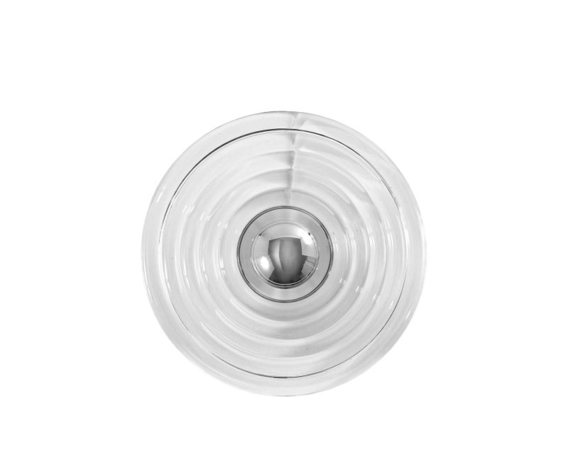 Nahaufnahme der runden Press Surface Wandleuchte von Tom Dixon aus transparentem Glas.