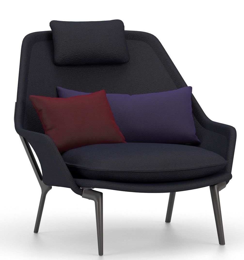 Vitra Slow Chair Sessel mit Stoffbezug in Schwarz, inklusive rotem und blauem Kissen.