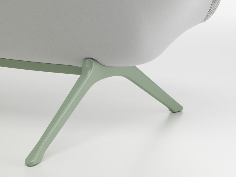 Detailaufnahme des Abalon Sofas von Vitra, das die hellgrünen Beine und die Polsterung zeigt.
