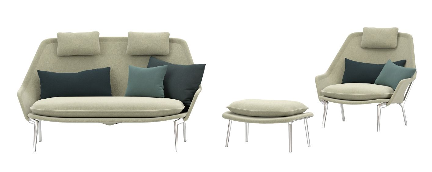 Vitra Slow Sofa und Sessel mit Hocker, Stoffbezug in Beige und Kissen in Blaugrün.