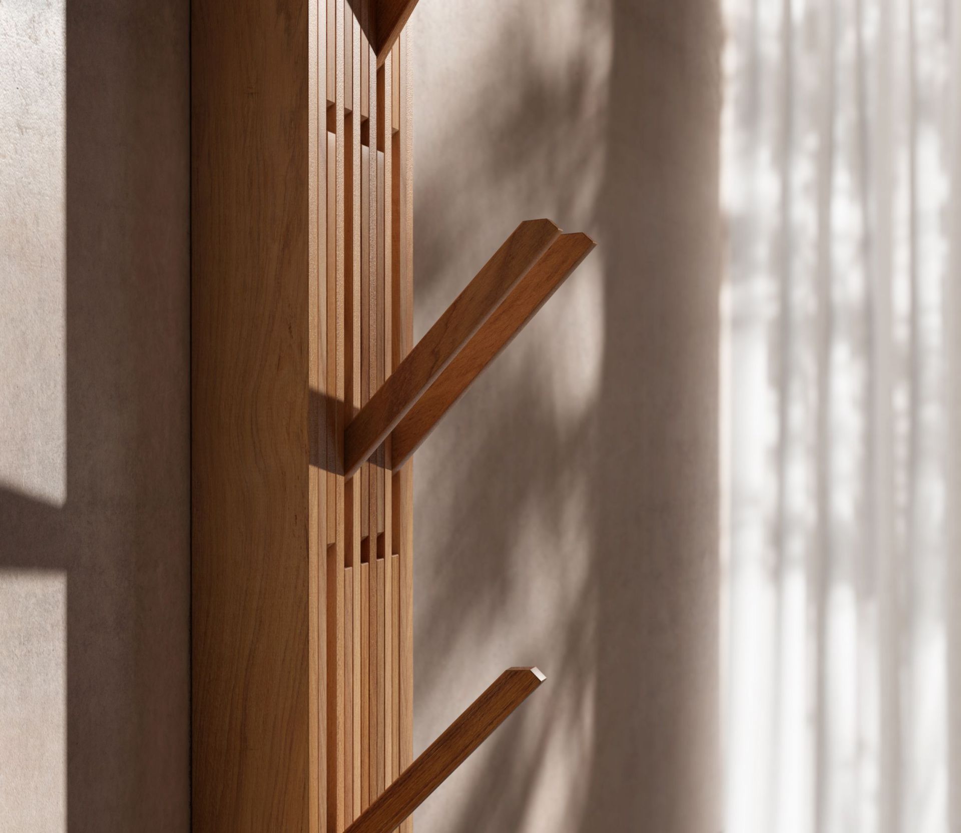 Nahaufnahme der Piano Wandgarderobe aus geölter Eiche Natur mit ausklappbaren Haken.