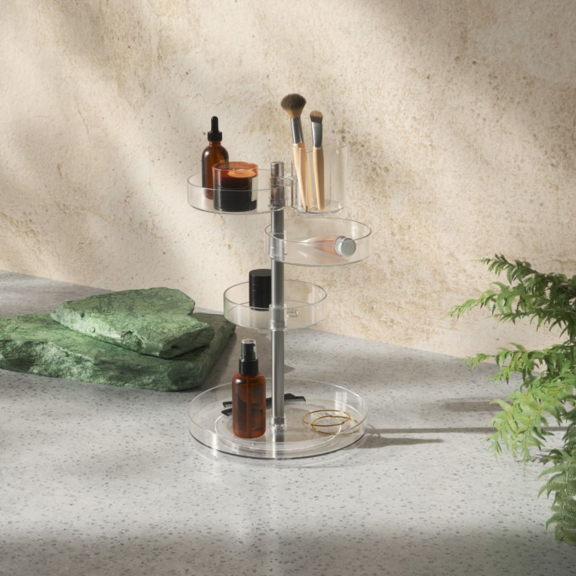 Umbra Pirouette Organizer mit Kosmetikprodukten, drehbarer Make-up Organizer aus transparentem Kunststoff für Badezimmer oder Schminktisch.