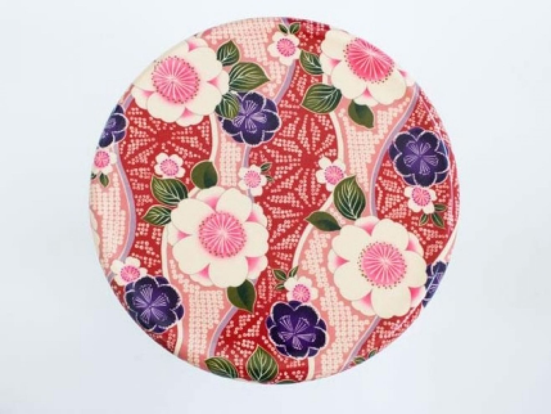 Ukiyo Tisch von Moroso, runder Beistelltisch mit floralem Muster in Rot, Weiß und Lila.
