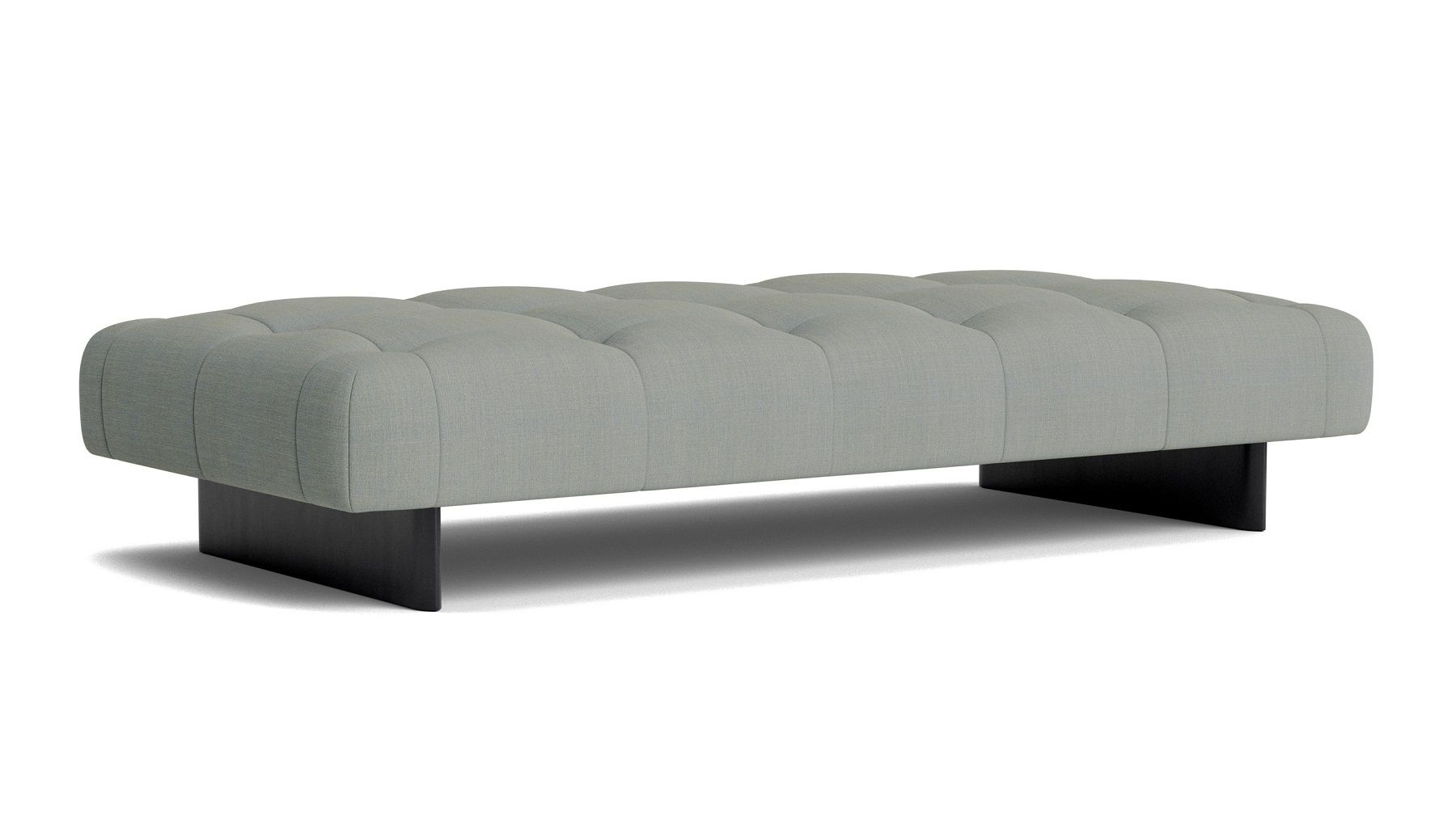 Graue Quilton Daybed Liege von Hay mit Knopfheftung und dunklem Holzfuß für Wohnzimmer und Lounge.